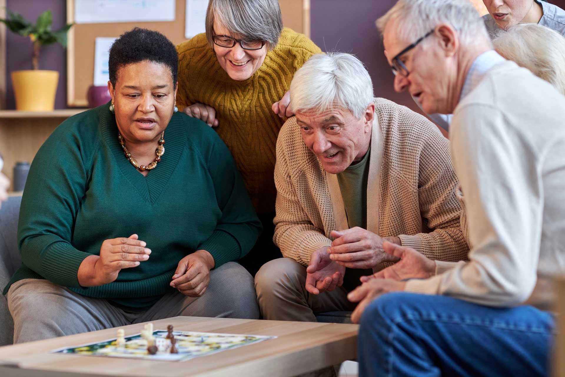 a group of people playing a board game together